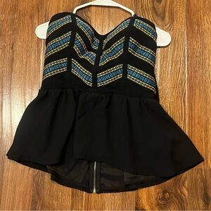 Bebe Black Peplum Waist Sleeveless Top with Gold and Blue Accents